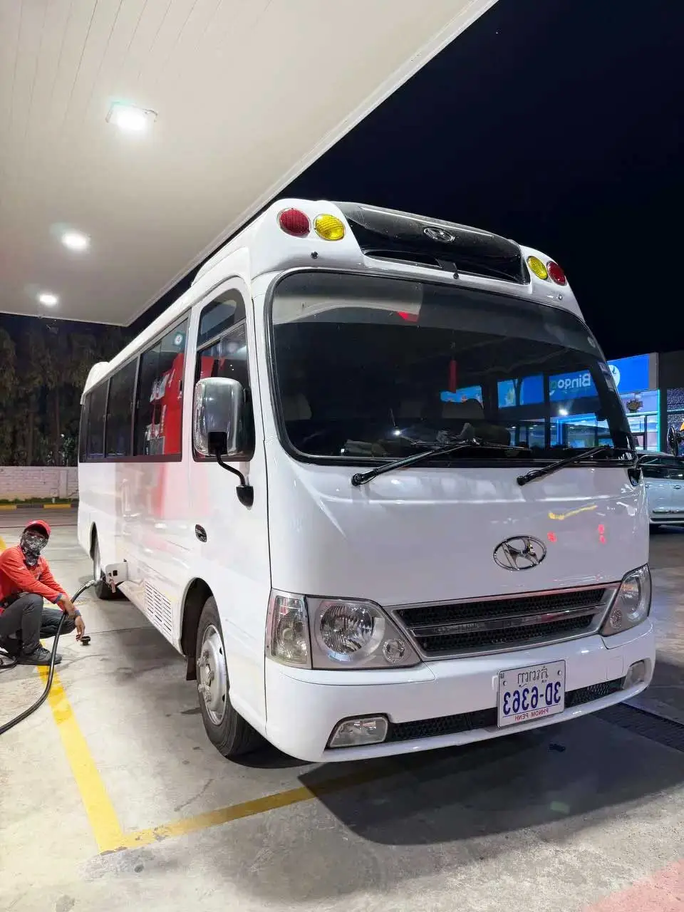 25-seat private mini bus rental for Phnom Penh airport transfer and Cambodia group tours